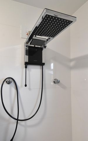 Casa de condomínio à venda com 110m², 3 quartos e 1 vagaBanheiro 2