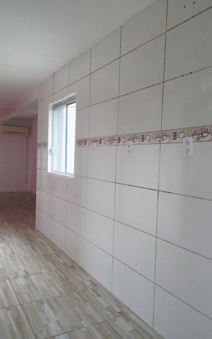 Casa para alugar com 70m², 3 quartos e 1 vagaCozinha