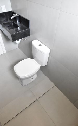 Casa de condomínio à venda com 109m², 3 quartos e 2 vagasBanheiro da Suíte