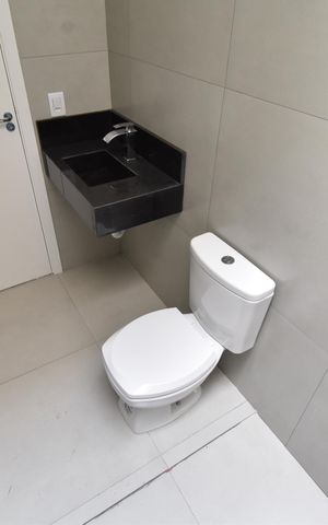 Casa de condomínio à venda com 109m², 3 quartos e 2 vagasBanheiro 2