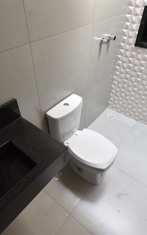 Casa de condomínio à venda com 109m², 3 quartos e 2 vagasBanheiro 2