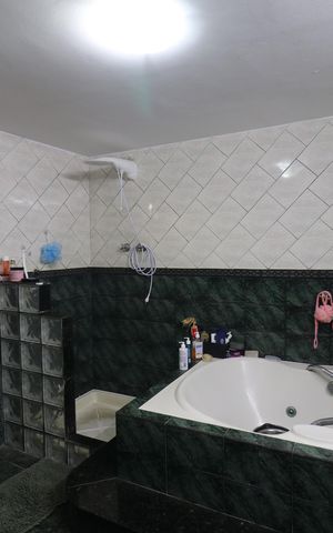 Casa à venda com 213m², 4 quartos e 1 vagaBanheiro da Suíte 2