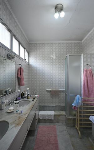 Casa à venda com 317m², 4 quartos e 5 vagasBanheiro Suíte 1