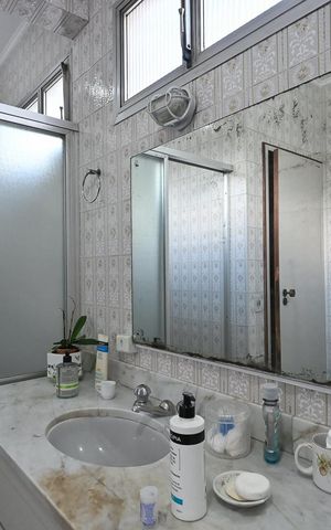 Casa à venda com 317m², 4 quartos e 5 vagasBanheiro Suíte 1