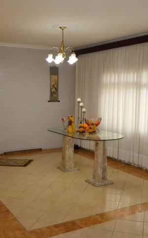 Casa à venda com 416m², 7 quartos e 5 vagasSala