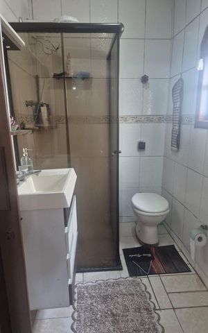 Casa à venda com 190m², 5 quartos e 2 vagasBanheiro