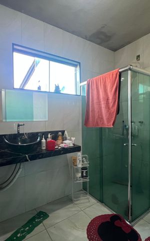Casa à venda com 300m², 4 quartos e 4 vagas Casa à venda com 300m², 4 quartos e 4 vagasBanheiro da Suíte 1