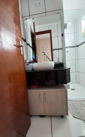 Casa de condomínio à venda com 66m², 2 quartos e 1 vagaBanheiro