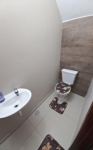 Casa de condomínio à venda com 66m², 2 quartos e 1 vagaBanheiro