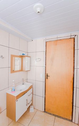 Casa à venda com 200m², 3 quartos e 2 vagasBanheiro da Edícula