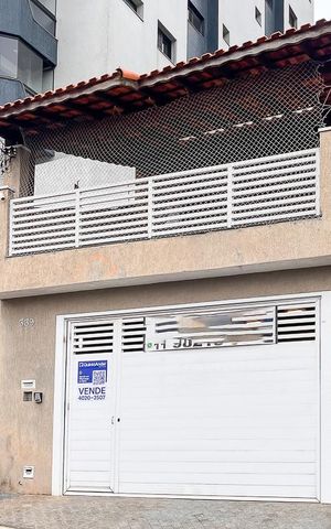 Casa à venda com 127m², 3 quartos e 2 vagasFachada + plaquinha