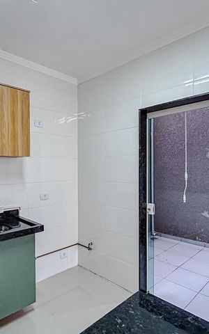 Casa de condomínio para alugar com 65m², 2 quartos e 2 vagasCozinha