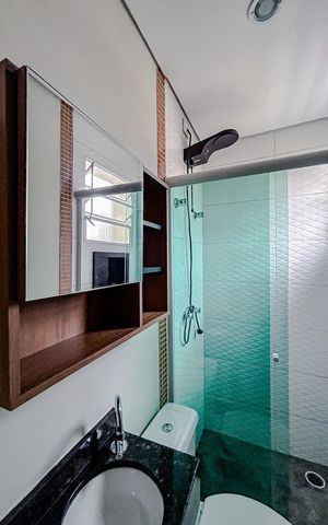 Casa de condomínio para alugar com 65m², 2 quartos e 2 vagasBanheiro da Suíte 1