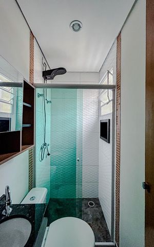 Casa de condomínio para alugar com 65m², 2 quartos e 2 vagasBanheiro da Suíte 1