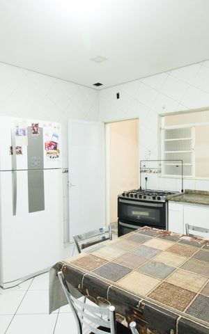 Casa à venda com 450m², 4 quartos e 4 vagas Casa à venda com 450m², 4 quartos e 4 vagasCozinha