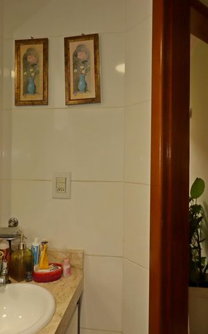 Casa de condomínio à venda com 115m², 3 quartos e 2 vagasBanheiro Social
