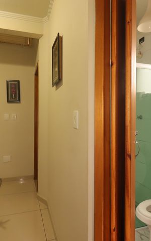 Casa de condomínio à venda com 115m², 3 quartos e 2 vagasCorredor