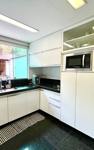 Casa à venda com 90m², 4 quartos e 3 vagas Casa à venda com 90m², 4 quartos e 3 vagasCozinha