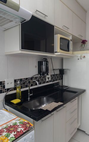 Apartamento à venda com 49m², 2 quartos e 1 vaga Apartamento à venda com 49m², 2 quartos e 1 vagaCozinha