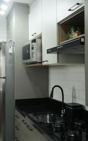 Apartamento à venda com 49m², 2 quartos e 1 vaga Apartamento à venda com 49m², 2 quartos e 1 vagaCozinha e Área de Serviço