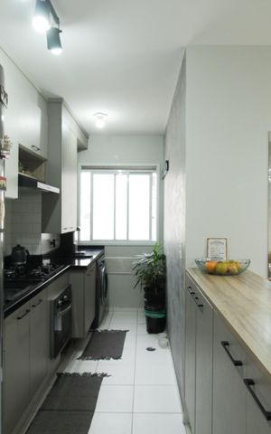 Apartamento à venda com 49m², 2 quartos e 1 vaga Apartamento à venda com 49m², 2 quartos e 1 vagaCozinha e Área de Serviço