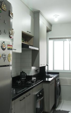 Apartamento à venda com 49m², 2 quartos e 1 vaga Apartamento à venda com 49m², 2 quartos e 1 vagaCozinha e Área de Serviço