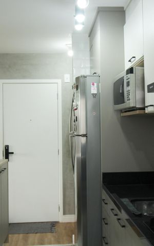 Apartamento à venda com 49m², 2 quartos e 1 vaga Apartamento à venda com 49m², 2 quartos e 1 vagaCozinha e Área de Serviço