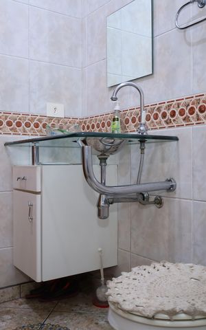 Casa à venda com 328m², 3 quartos e 8 vagasBanheiro 2
