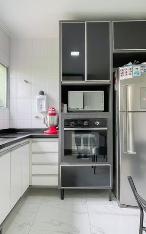 Casa de condomínio à venda com 65m², 2 quartos e 2 vagas Casa de condomínio à venda com 65m², 2 quartos e 2 vagasCozinha