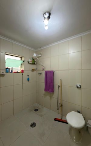 Casa à venda com 256m², 3 quartos e 2 vagasSuíte 3 Banheiro 