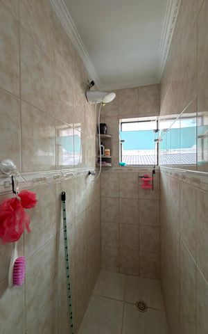 Casa à venda com 256m², 3 quartos e 2 vagasSuíte 2 Banheiro 