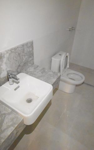 Casa de condomínio à venda com 266m², 3 quartos e 2 vagasBanheiro de serviço