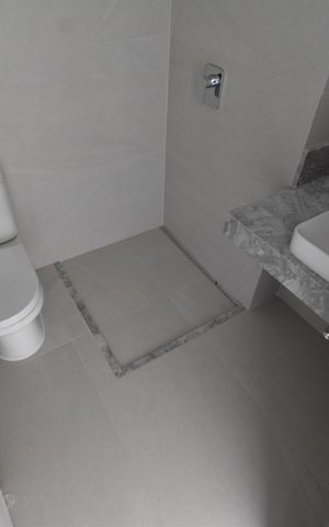 Casa de condomínio à venda com 266m², 3 quartos e 2 vagasBanheiro da Suíte 2