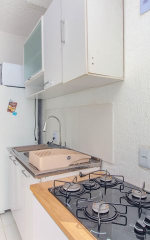 Apartamento à venda com 42m², 2 quartos e 1 vaga Apartamento à venda com 42m², 2 quartos e 1 vagaCozinha e Área de Serviço