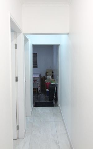 Casa à venda com 150m², 3 quartos e 2 vagas Casa à venda com 150m², 3 quartos e 2 vagasCorredor