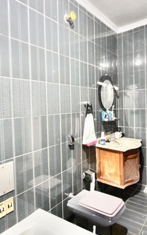 Casa à venda com 150m², 3 quartos e 2 vagas Casa à venda com 150m², 3 quartos e 2 vagasBanheiro da suíte 1