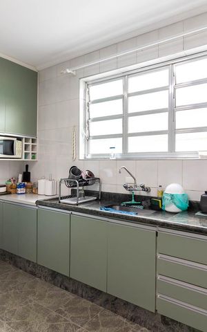 Casa à venda com 127m², 2 quartos e 2 vagas Casa à venda com 127m², 2 quartos e 2 vagasCozinha