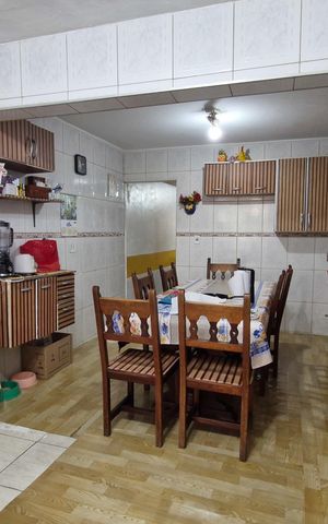 Casa à venda com 130m², 4 quartos e 1 vaga Casa à venda com 130m², 4 quartos e 1 vagaCozinha