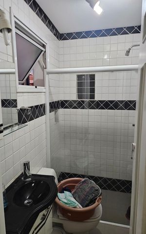 Casa de condomínio à venda com 312m², 4 quartos e 4 vagas Casa de condomínio à venda com 312m², 4 quartos e 4 vagasBanheiro