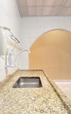 Casa à venda com 116m², 2 quartos e 2 vagas Casa à venda com 116m², 2 quartos e 2 vagasCozinha