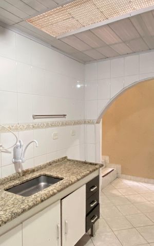 Casa à venda com 116m², 2 quartos e 2 vagas Casa à venda com 116m², 2 quartos e 2 vagasCozinha