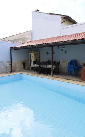 Casa de condomínio à venda com 305m², 4 quartos e 2 vagasQuintal
