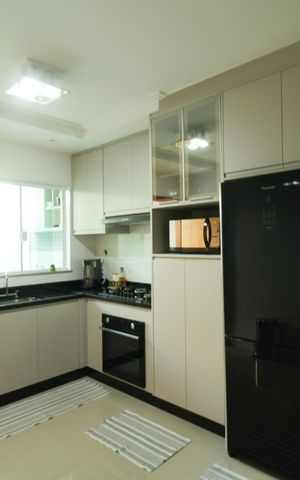 Casa à venda com 146m², 3 quartos e 2 vagas Casa à venda com 146m², 3 quartos e 2 vagasCozinha