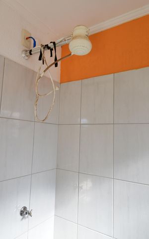 Casa de condomínio à venda com 292m², 5 quartos e 4 vagasBanheiro de serviço