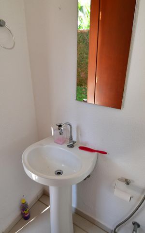 Casa de condomínio à venda com 292m², 5 quartos e 4 vagasBanheiro de serviço