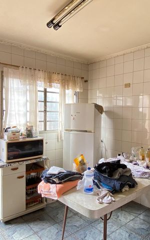Casa à venda com 125m², 2 quartos e 2 vagas Casa à venda com 125m², 2 quartos e 2 vagasCozinha