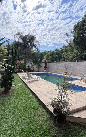Casa de condomínio para alugar com 618m², 4 quartos e 4 vagas Casa de condomínio para alugar com 618m², 4 quartos e 4 vagasÁrea externa