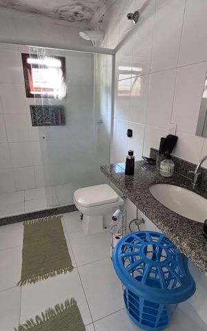 Casa de condomínio para alugar com 618m², 4 quartos e 4 vagas Casa de condomínio para alugar com 618m², 4 quartos e 4 vagasBanheiro do Quarto 2