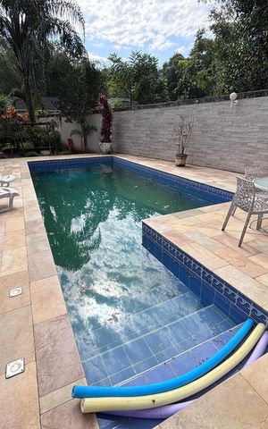 Casa de condomínio para alugar com 618m², 4 quartos e 4 vagas Casa de condomínio para alugar com 618m², 4 quartos e 4 vagasÁrea externa