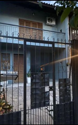 Casa à venda com 125m², 2 quartos e 2 vagas Casa à venda com 125m², 2 quartos e 2 vagasÁrea externa